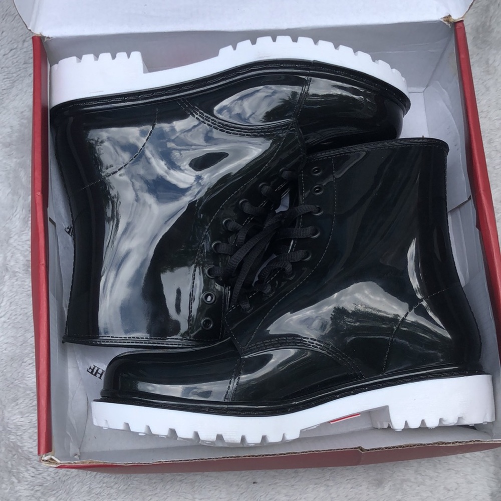 Henry Ferreira lace up sole rain boots